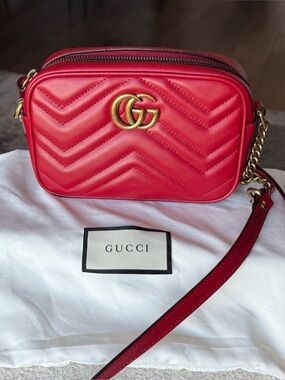Gucci marmont mini bag in red 

Excellent condition 

Includes dust bag